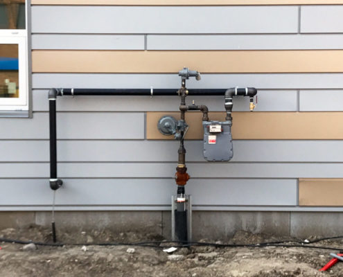 residential plumbing pipe install exterior